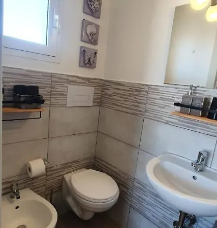 Orchidea לינה וארוחת בוקר אולביה